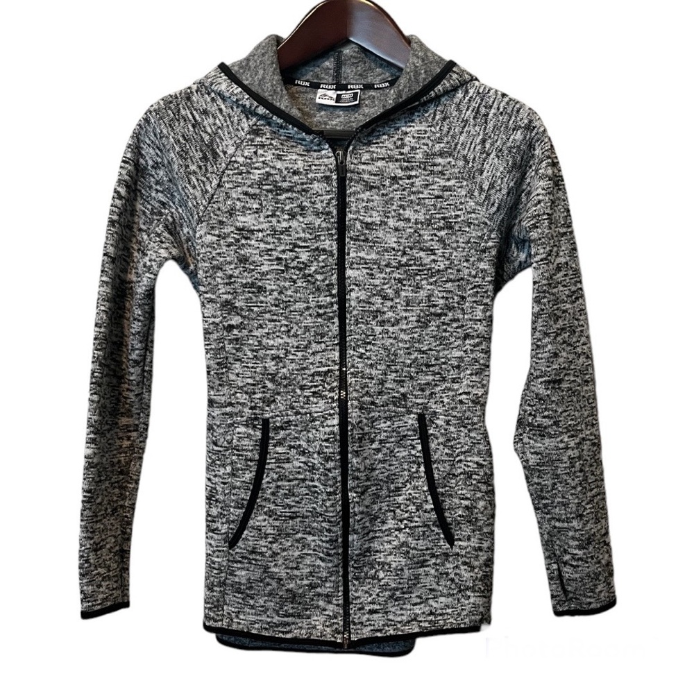 RBX hooded lightweight jacket with slit pockets and thumb holes.